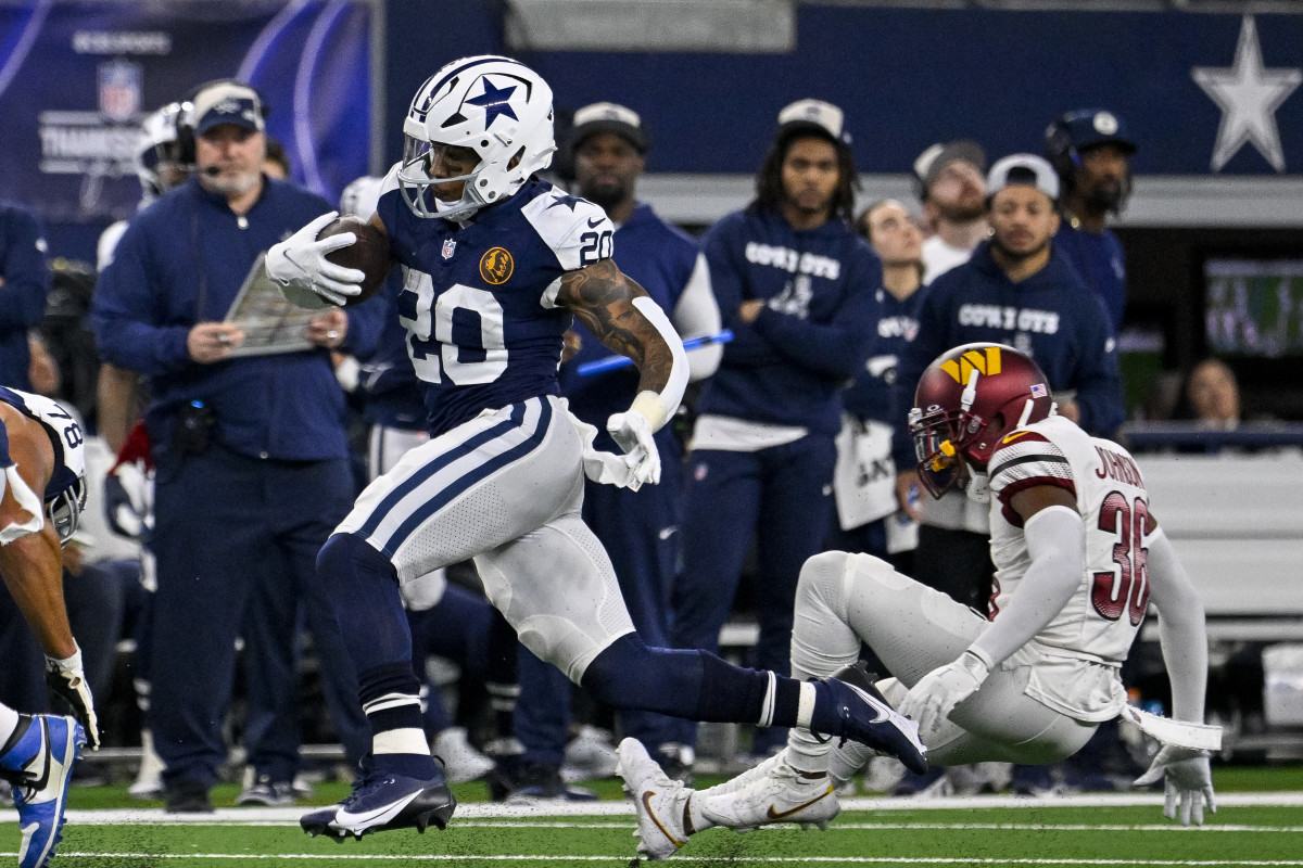 Pollard runs through the Commanders' defense during Thursday's game.
